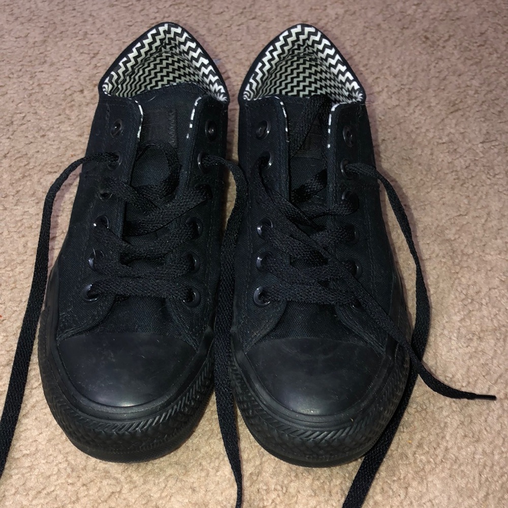 All black converse.